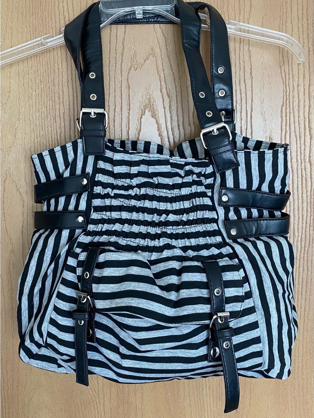Striped Black and Gray Purse with Adjustable Straps and Buckle Details